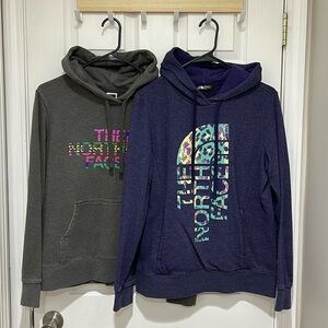 2 North Face Women’s Size Medium hooded sweatshirts